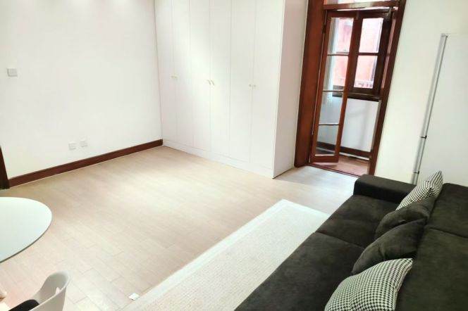 Jing'an District, right by the West Nanjing Road metro station Lines 2, 12, and 13