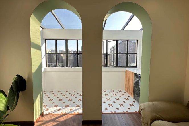 Changshu Road Metro Station, building with copper plaques, entire floor of villas with terraces