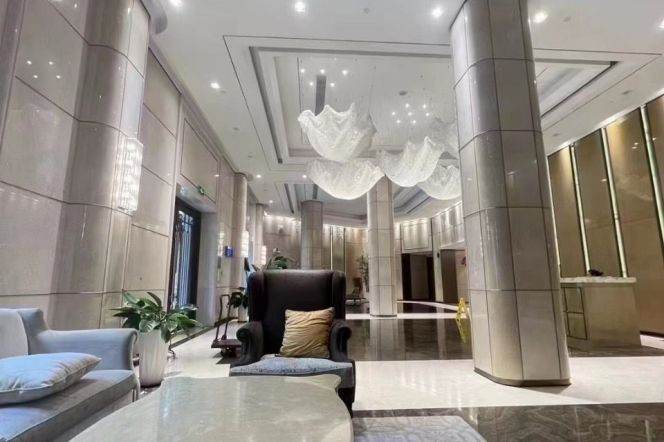 Shanghai Bay Phase 3, a luxury residence in Xuhui Riverfront area, featuring a view of the river.