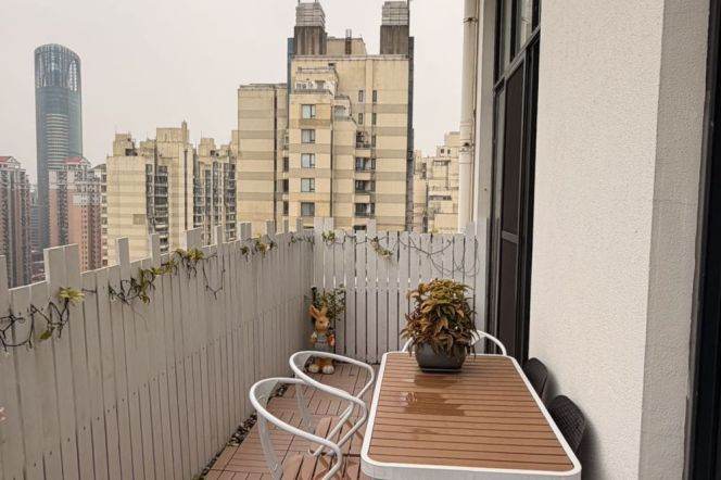 Loft-Style Residence nr Xintiandi: Rare High-Ceiling 2BR with Terrace
