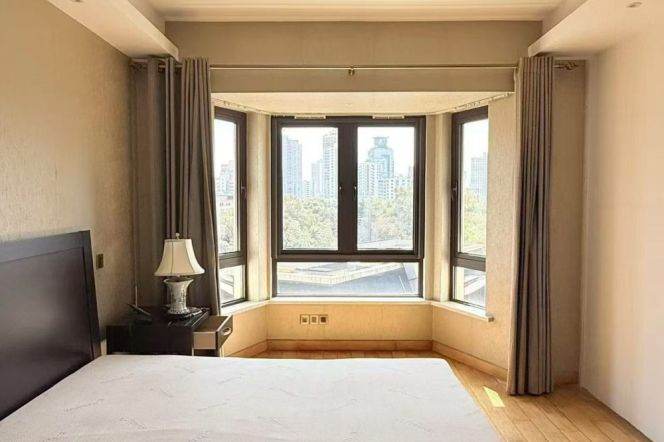 Taiyuan villa, with an oversized garden terrace, at Hengshan Road subway station