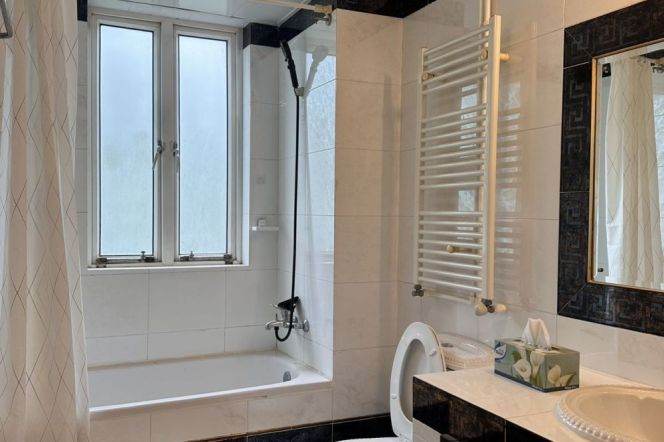 Subway Station Hengshan Road on Line 1, elevator building, balcony with green plants