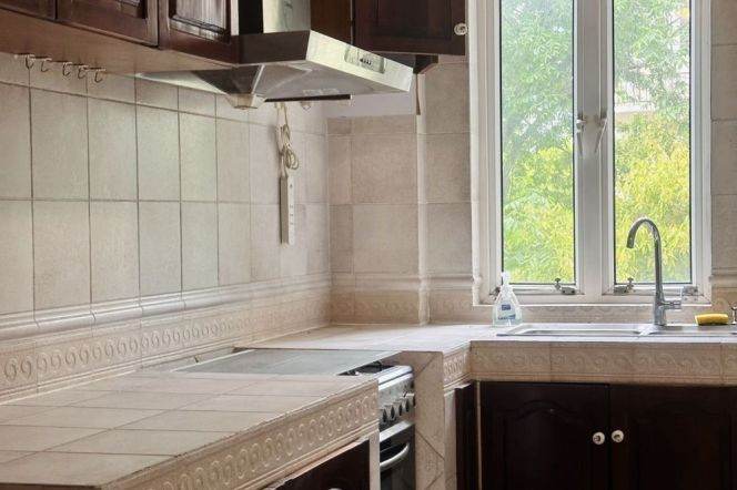 Subway Station Hengshan Road on Line 1, elevator building, balcony with green plants