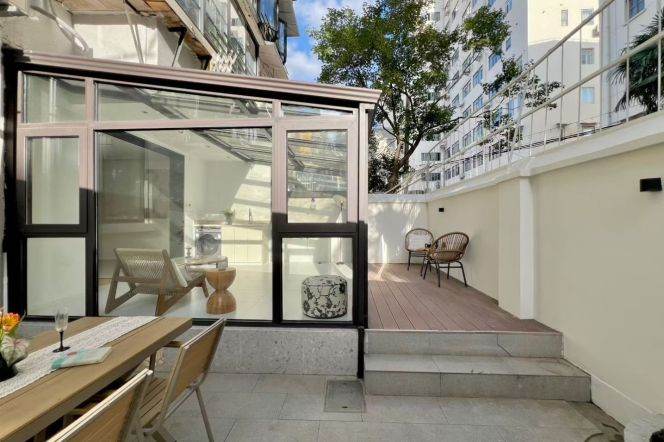 Charming 2-Bed with Sunroom & Private Patio – Prime Fuxing Road M