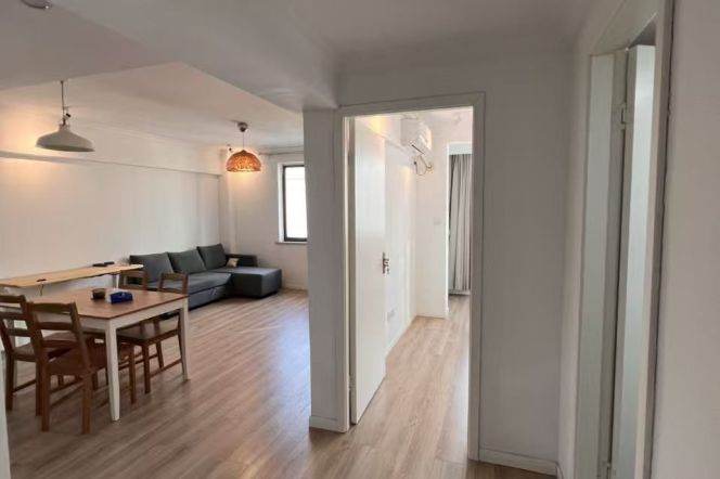 High rise bright spacious Apt floor heating@ line 2,12,13 West Nanjing Rd.