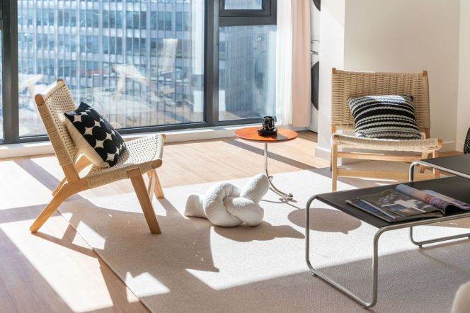 South-Facing Apartment with Floor-to-Ceiling Windows, Full Heating & Premium Appliances  