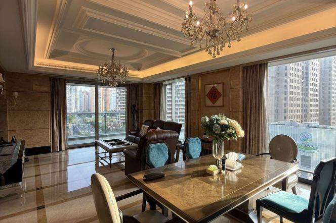 The Bund of Huangpu River, a large 3-bers apartment, with greenery visible from the windows.