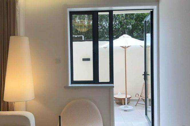 1BR Apartment near Shanghai Indoor Stadium Metro with Terrace (L1/L4)